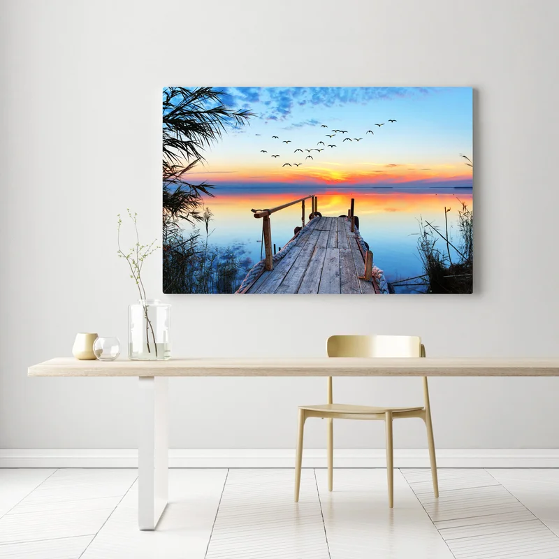 Leinwandbild steg bei sonnenuntergang über ruhigem see Leinwandbild steg bei sonnenuntergang über ruhigem see