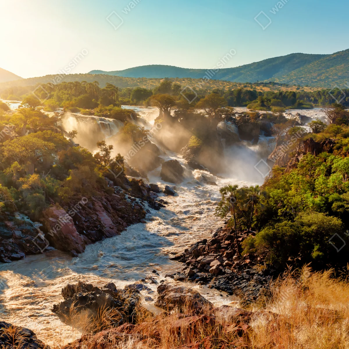 Leinwandbild sonnenaufgang über Epupa-wasserfälle Leinwandbild sonnenaufgang über Epupa-wasserfälle