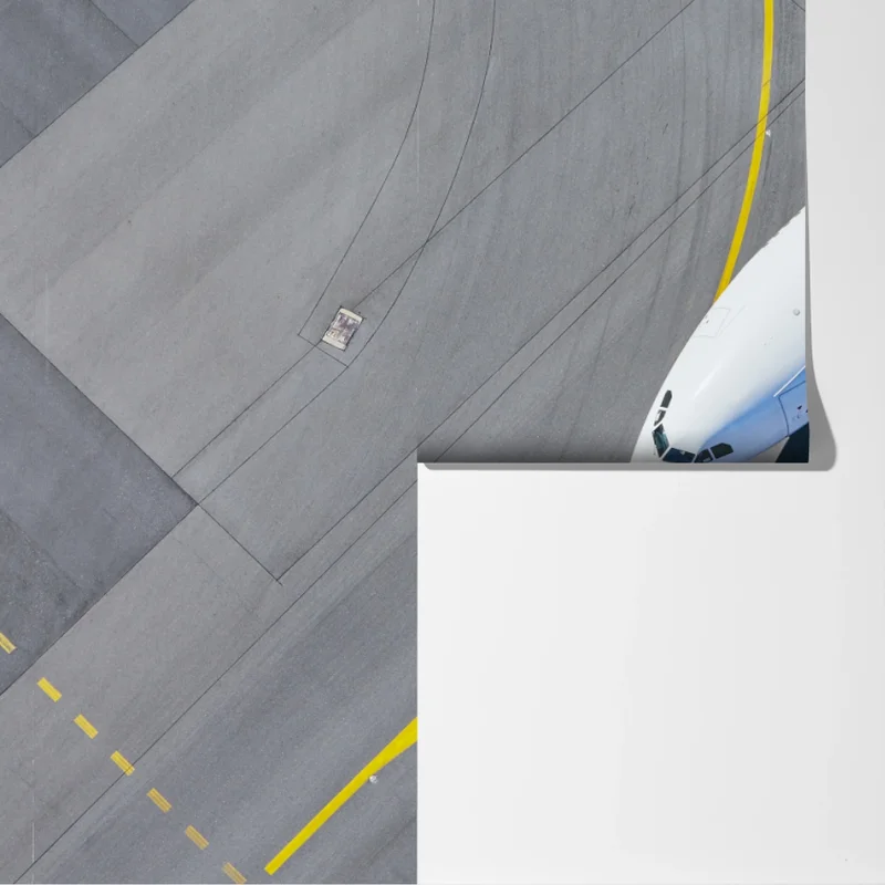 Fototapete luftaufnahme eines flugzeugs auf dem rollfeld Fototapete luftaufnahme eines flugzeugs auf dem rollfeld