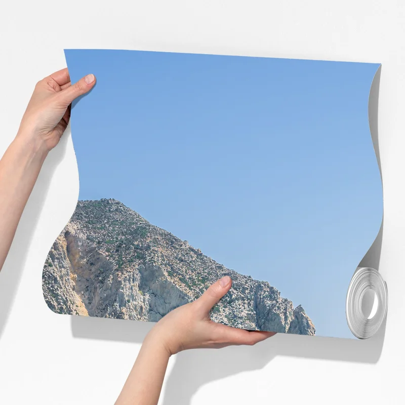 Fototapete sonniger türkisfarbener strand mit klippen Fototapete sonniger türkisfarbener strand mit klippen