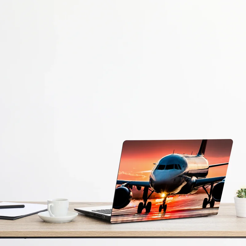Laptop-Aufkleber jet im sonnenuntergang auf der startbahn