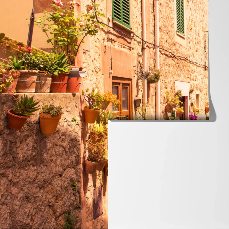 Fototapete sonnige mediterrane gasse mit blumentöpfen Fototapete sonnige mediterrane gasse mit blumentöpfen