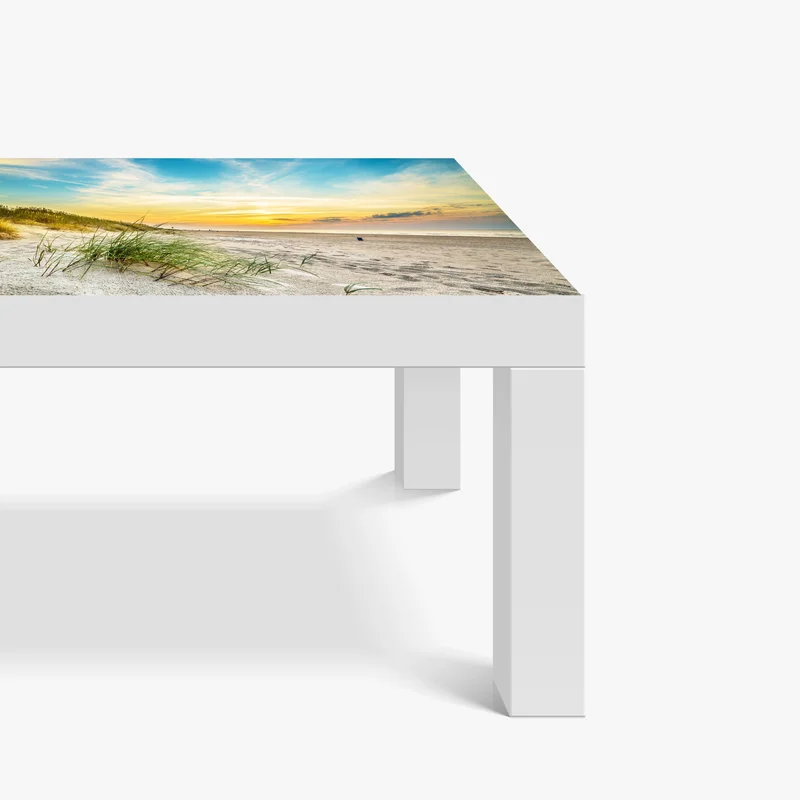 Tischaufkleber und Schreibtischaufkleber sonnenuntergang über ruhigen dünen