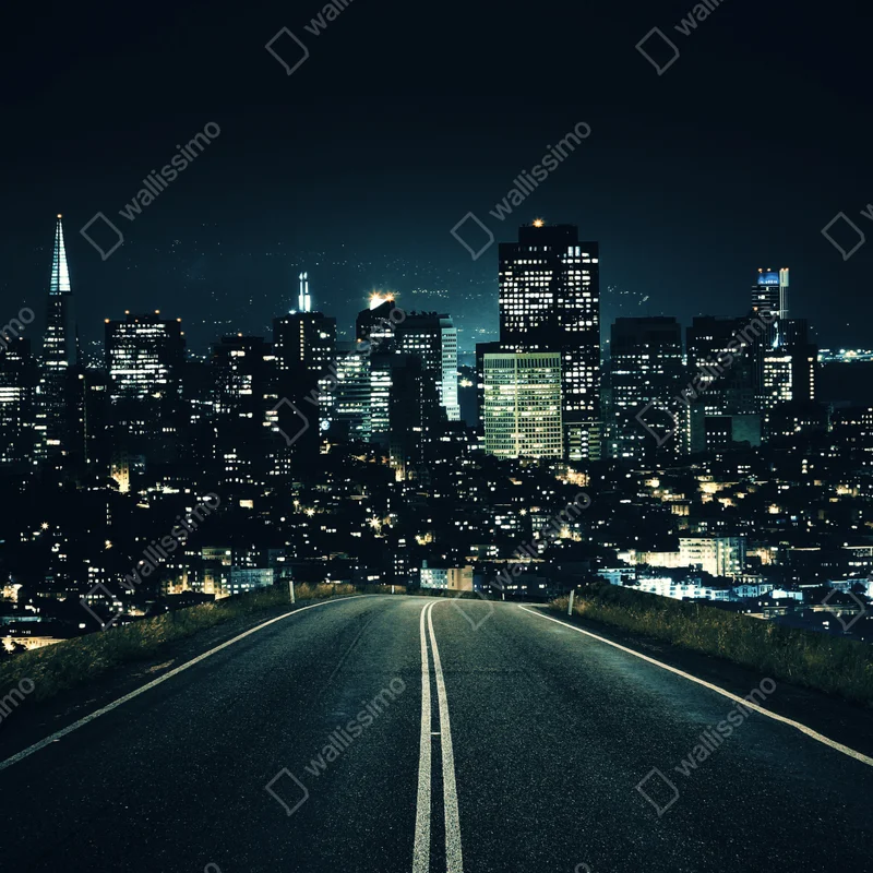 Leinwandbild straße zur beleuchteten stadtsilhouette bei nacht Leinwandbild straße zur beleuchteten stadtsilhouette bei nacht