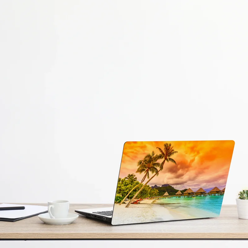 Naklejka na laptopa zachód słońca w Bora Bora nad bungalowami na wodzie