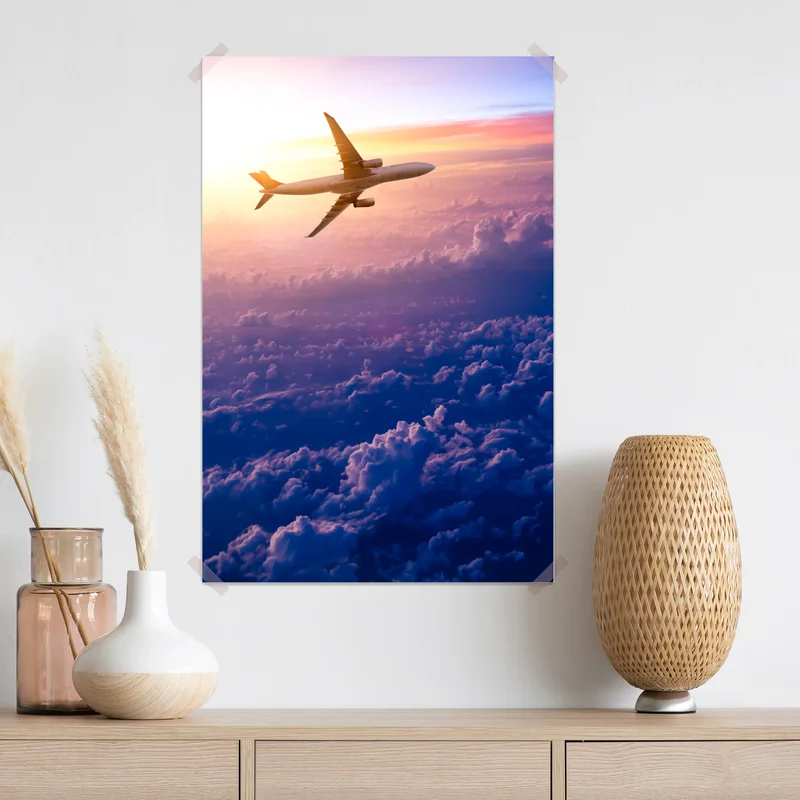 Poster flugzeug über den wolken bei sonnenaufgang Poster flugzeug über den wolken bei sonnenaufgang