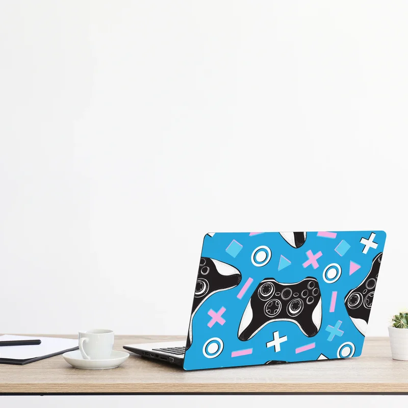 Naklejka na laptopa wzór padów do gier na niebieskim tle