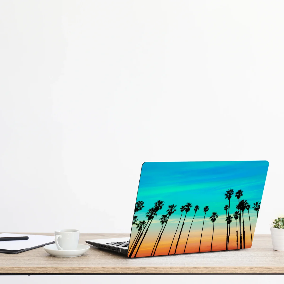 Naklejka na laptopa palmy o zachodzie słońca w Kalifornii Naklejka na laptopa palmy o zachodzie słońca w Kalifornii