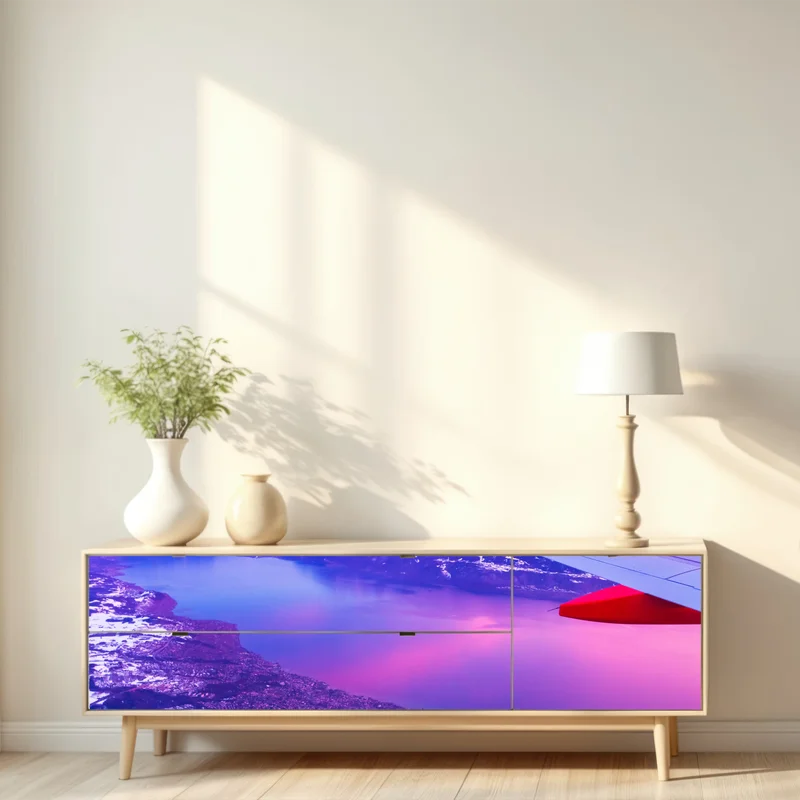 Repositionierbarer Aufkleber luftaufnahme einer stadt am see bei sonnenuntergang