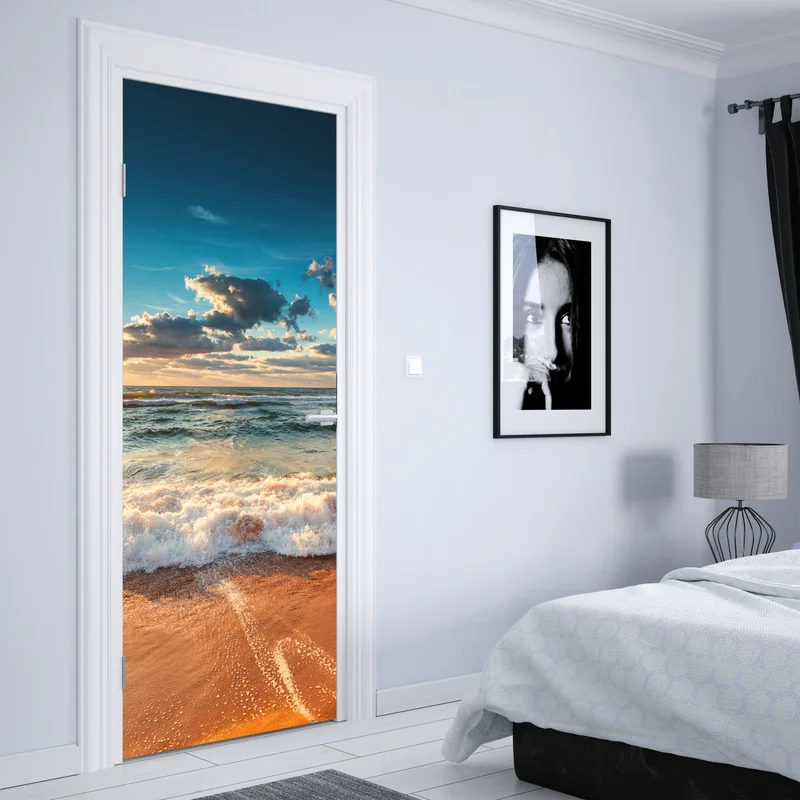 Türaufkleber goldener sonnenaufgang über der meeresküste