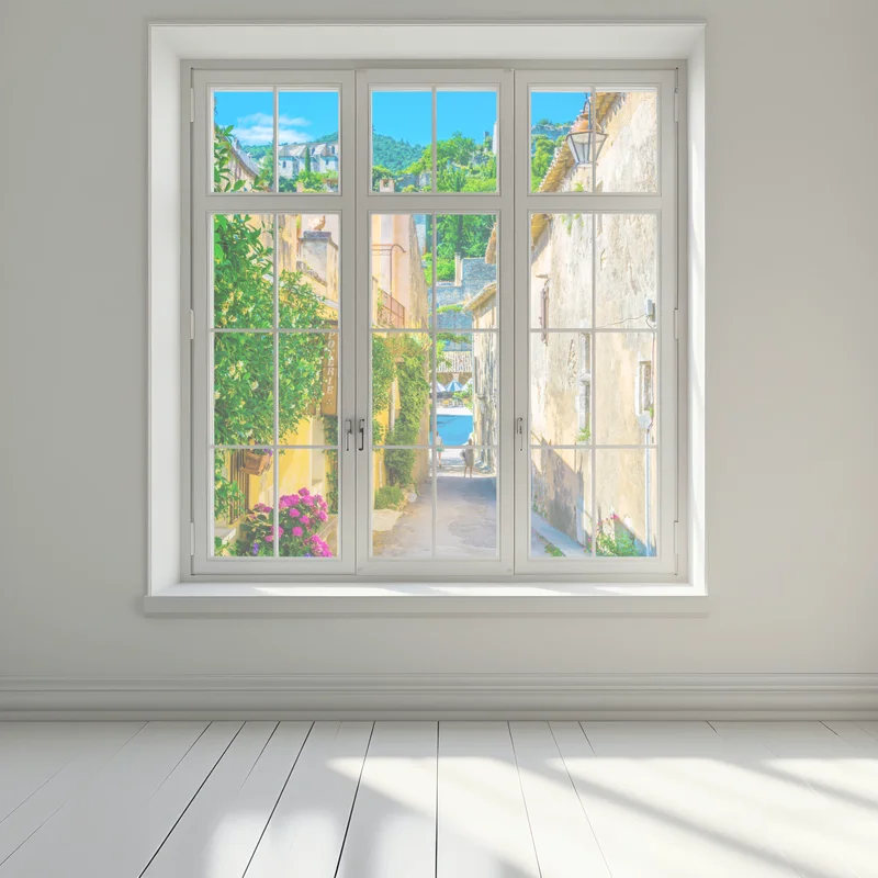 Fensteraufkleber sonnenbeschienene gasse in einem mediterranen dorf