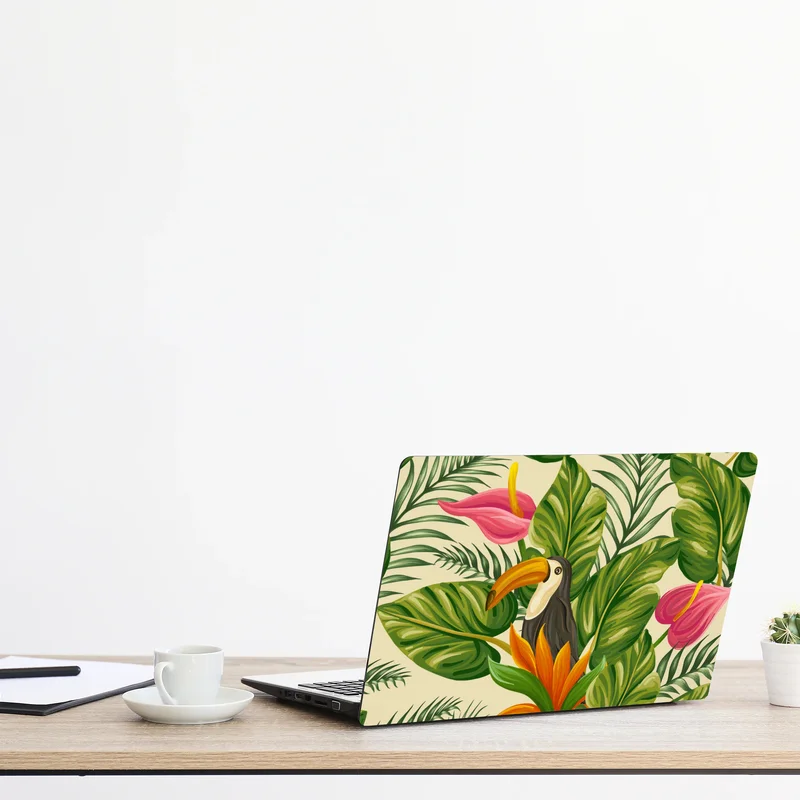Naklejka na laptopa tropikalny wzór botaniczny z tukanem