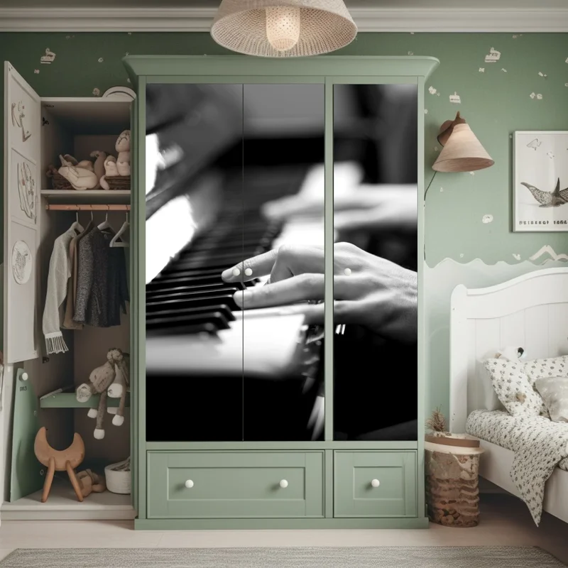 Schrankaufkleber intime hände auf klaviertasten in monochrom