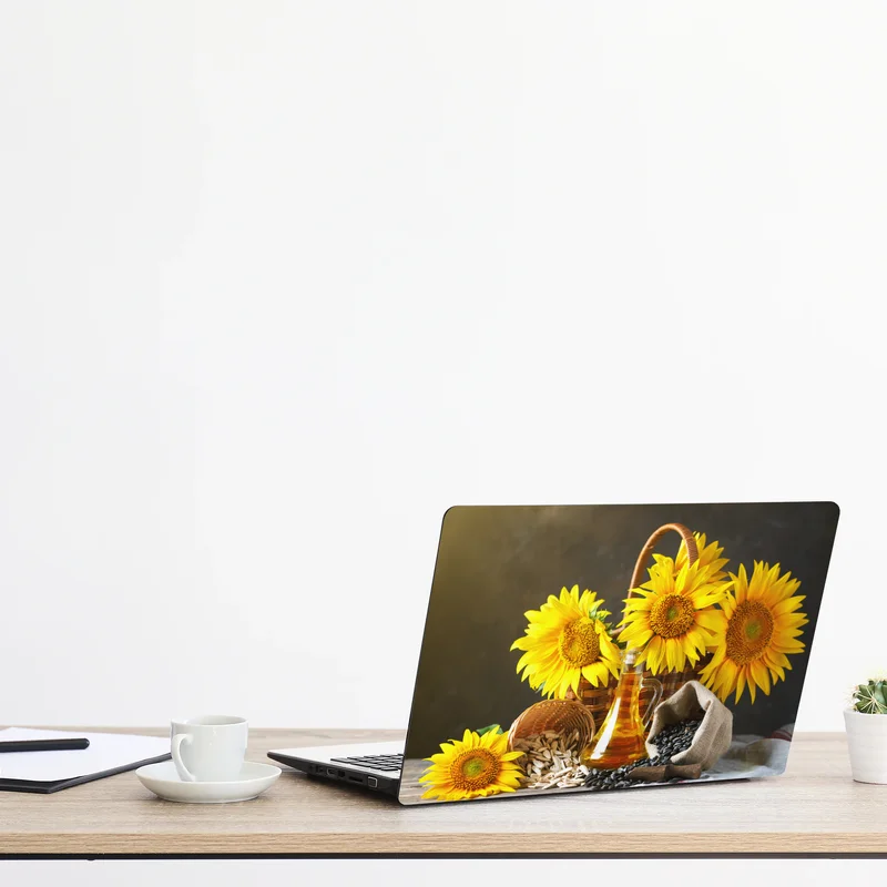 Laptop-Aufkleber leuchtendes stillleben mit sonnenblumen, kernen und öl