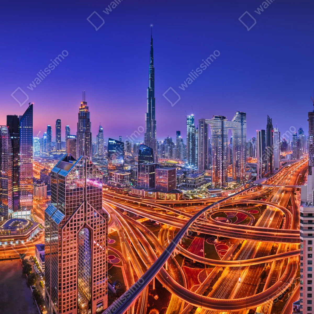 Naklejka na laptopa Dubaj nocą: panorama miejskich świateł Naklejka na laptopa Dubaj nocą: panorama miejskich świateł