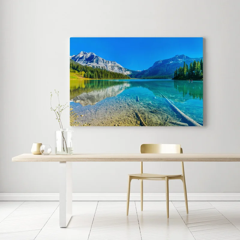 Leinwandbild türkises alpensee mit bergreflexionen Leinwandbild türkises alpensee mit bergreflexionen