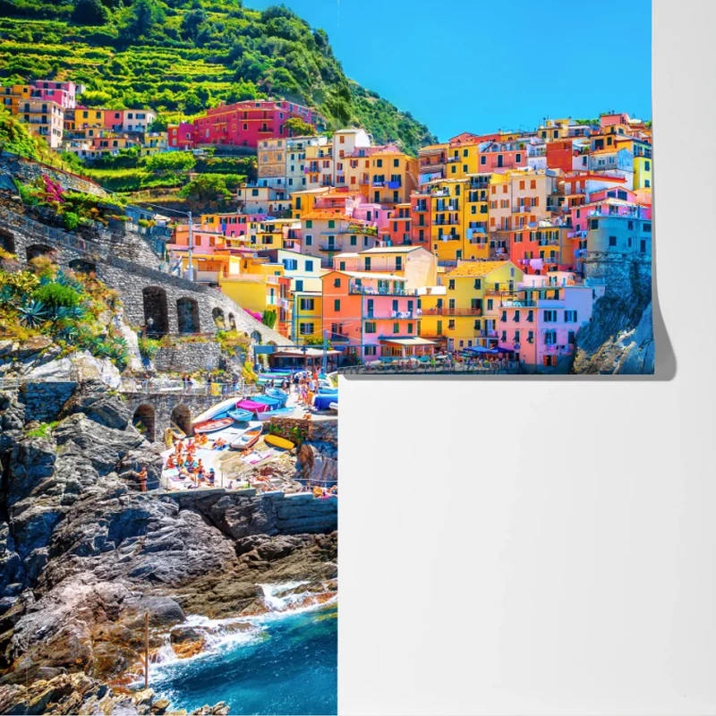 Fototapete farbenfrohes dorf am klippenmeer Fototapete farbenfrohes dorf am klippenmeer