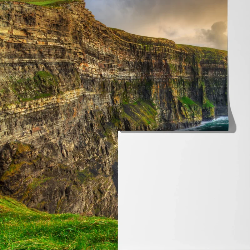 Fototapete dramatische küstenklippen bei sonnenuntergang Fototapete dramatische küstenklippen bei sonnenuntergang