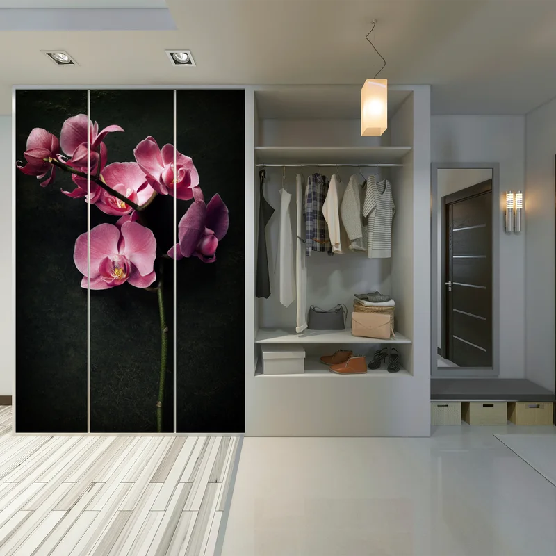 Schrankaufkleber rosa orchidee vor dunklem vintage-hintergrund