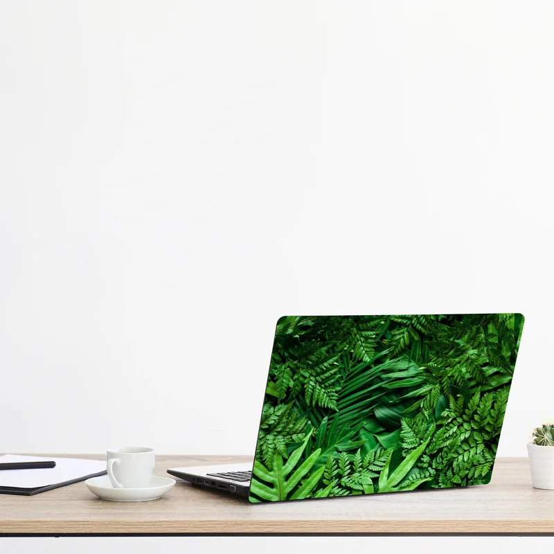 Naklejka na laptopa bujny zielony wzór liści