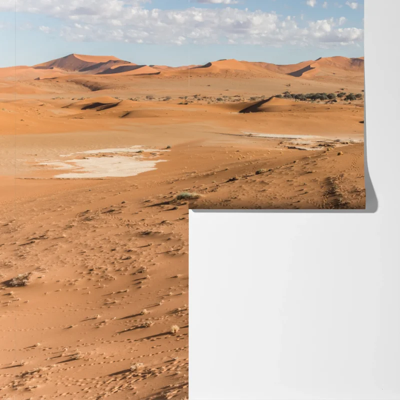 Fototapeta bezgraniczne wydmy pustyni pod błękitnym niebem Fototapeta bezgraniczne wydmy pustyni pod błękitnym niebem