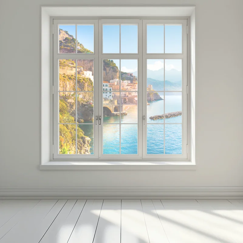 Fensteraufkleber sonniges küstendorf am klippenrand