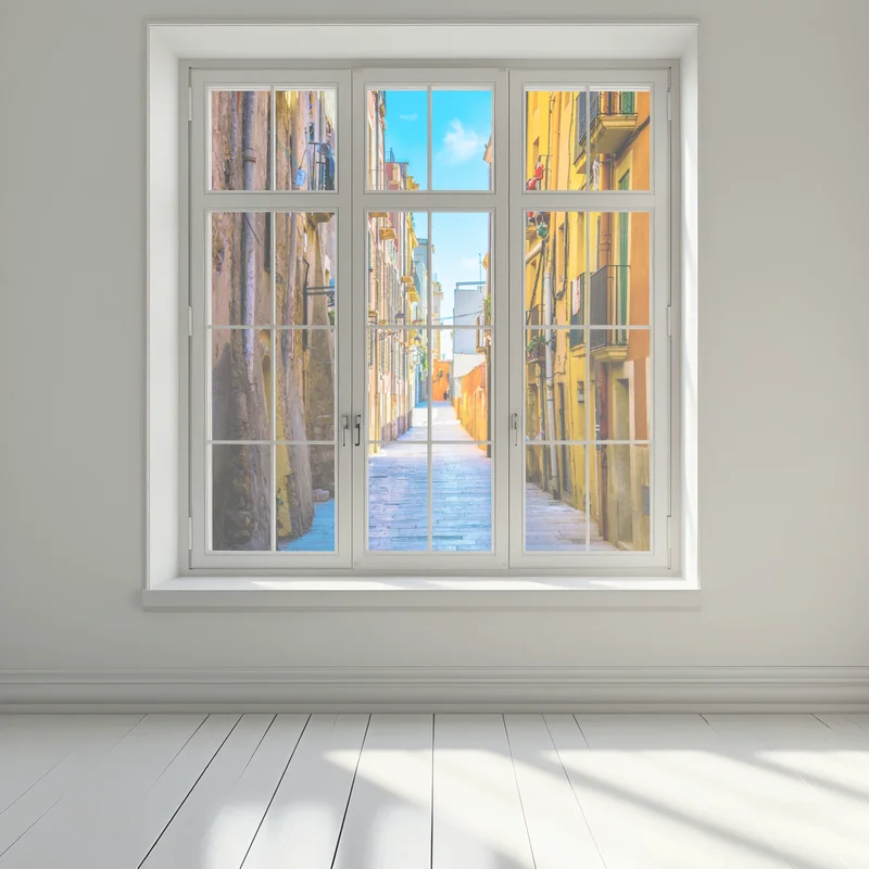 Fensteraufkleber sonnenbeschienene mediterrane gasse mit bunten fassaden Fensteraufkleber sonnenbeschienene mediterrane gasse mit bunten fassaden