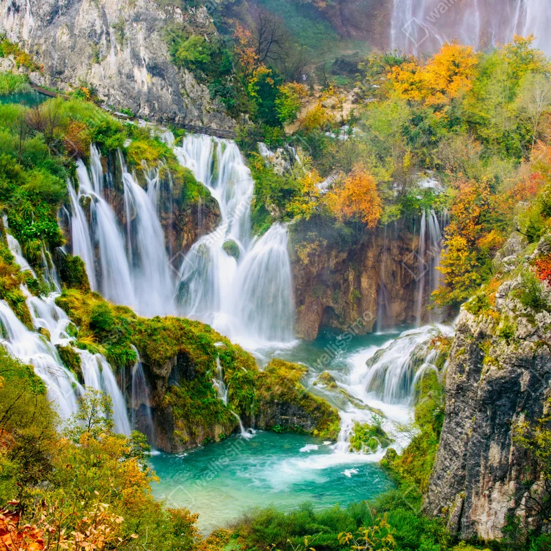 Leinwandbild türkisfarbener wasserfall im herbst Leinwandbild türkisfarbener wasserfall im herbst