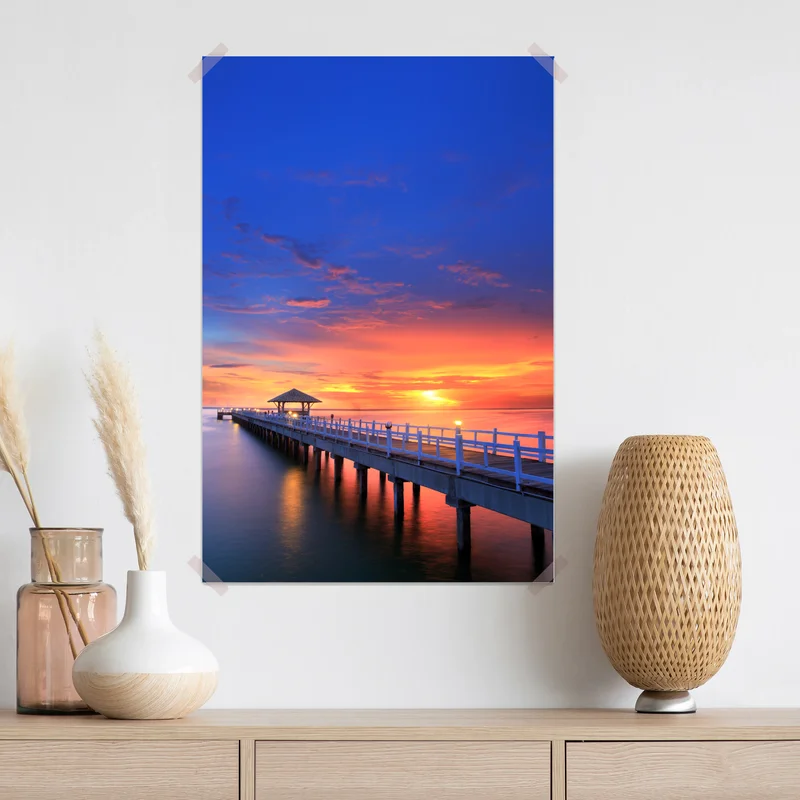 Poster mole bei sonnenuntergang am strand Poster mole bei sonnenuntergang am strand