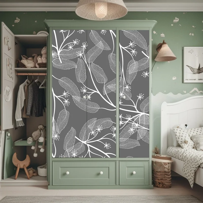 Schrankaufkleber zarte weiße blätter auf grauem hintergrund