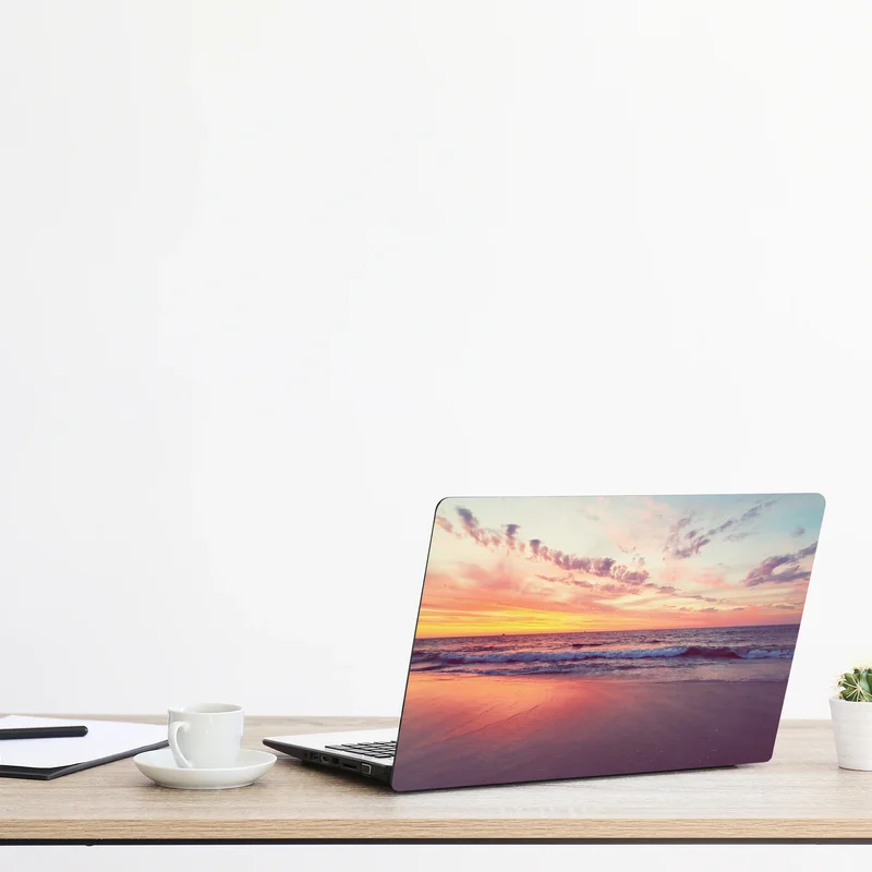 Laptop-Aufkleber pastelliger sonnenuntergang über ruhigem meer Laptop-Aufkleber pastelliger sonnenuntergang über ruhigem meer