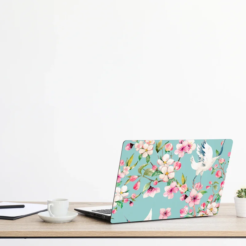 Naklejka na laptopa turkusowy wzór kwitnącej wiśni i żurawia