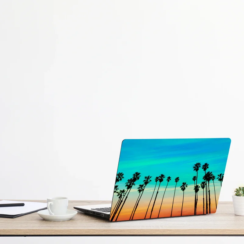 Naklejka na laptopa palmy o zachodzie słońca w Kalifornii