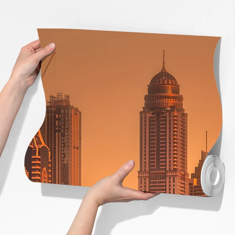 Fototapete Dubai skyline im goldenen licht Fototapete Dubai skyline im goldenen licht