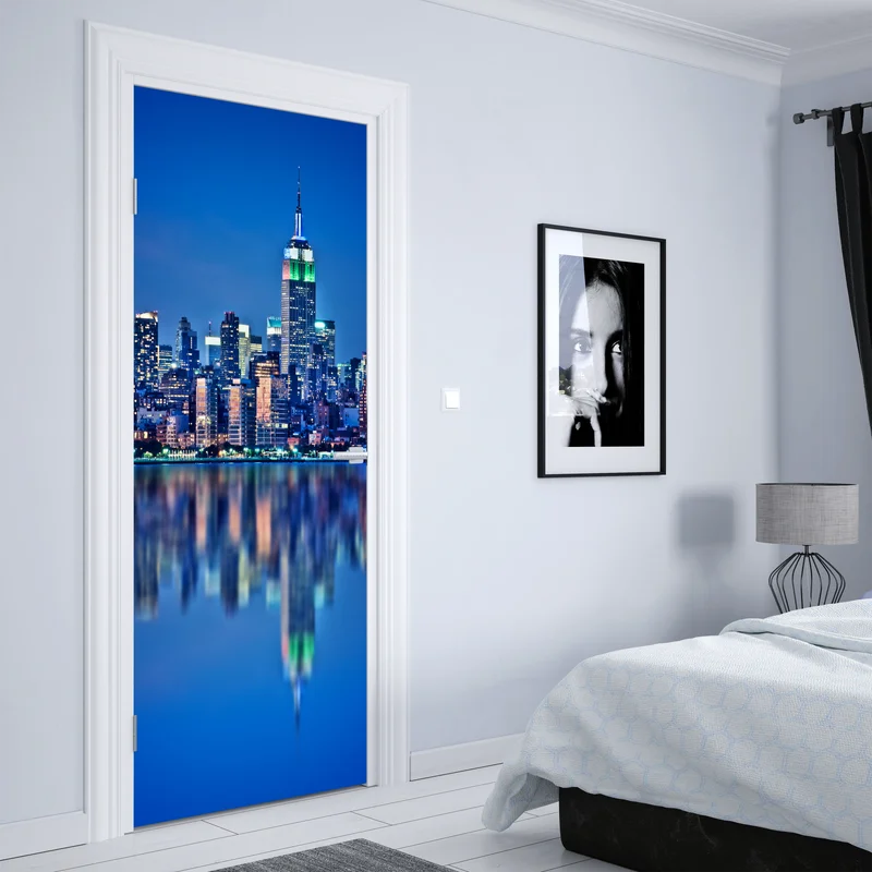 Türaufkleber New York skyline bei nacht mit spiegelung