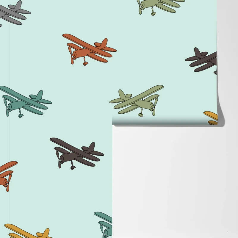 Fototapeta wzór z dwupłatowcami na turkusowym tle Fototapeta wzór z dwupłatowcami na turkusowym tle