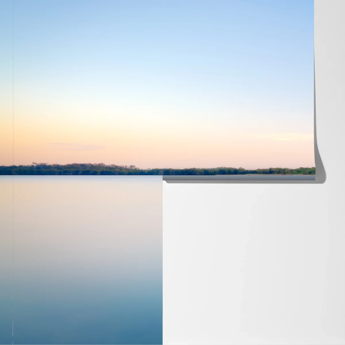 Fototapeta samotne drzewo nad spokojnym jeziorem Fototapeta samotne drzewo nad spokojnym jeziorem