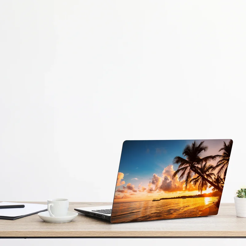 Naklejka na laptopa tropikalny zachód słońca z sylwetkami palm, Dominikana