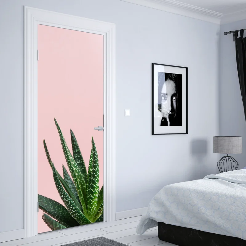 Türaufkleber grüner aloes auf rosa hintergrund