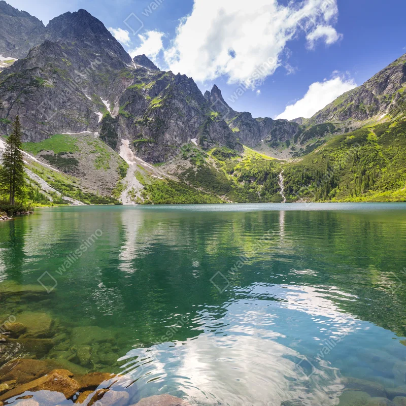 Fensteraufkleber ruhiger smaragdgrüner bergsee vor schroffen gipfeln Fensteraufkleber ruhiger smaragdgrüner bergsee vor schroffen gipfeln