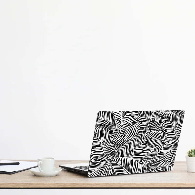 Naklejka na laptopa monochromatyczny wzór tropikalnych liści Naklejka na laptopa monochromatyczny wzór tropikalnych liści