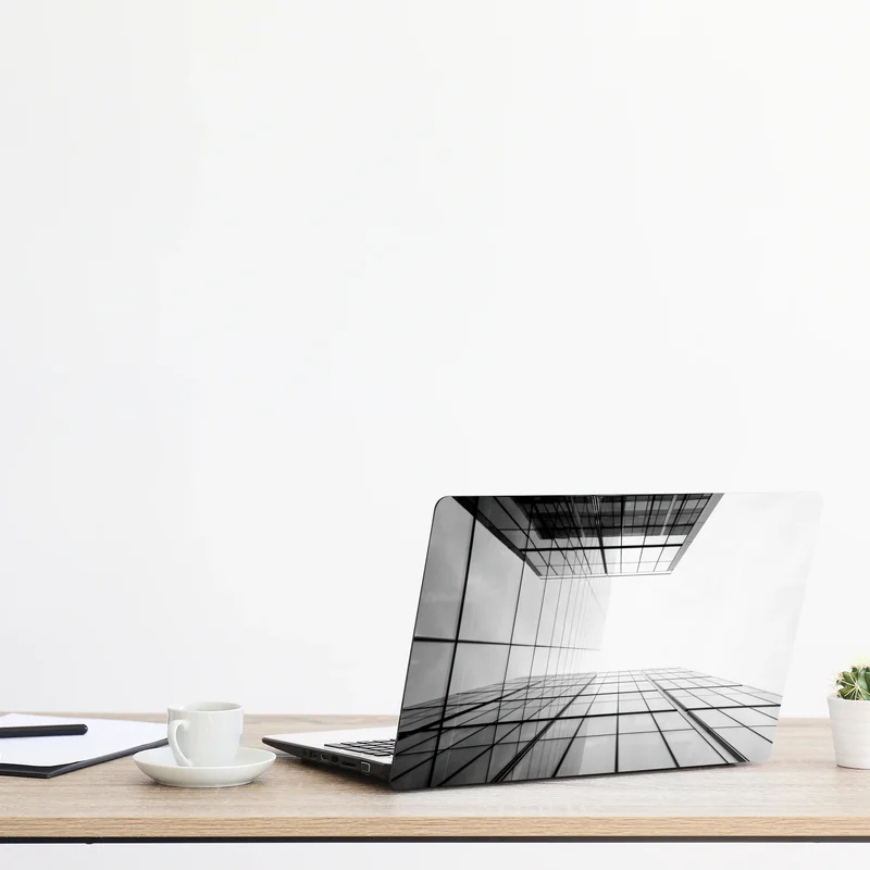 Naklejka na laptopa minimalistyczna perspektywa szklanego wieżowca