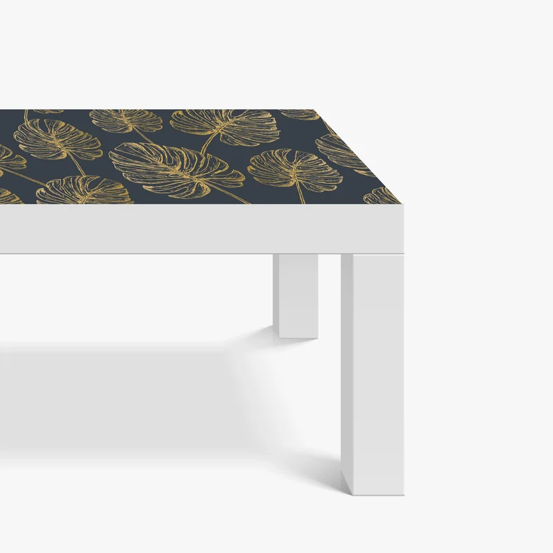 Tischaufkleber und Schreibtischaufkleber goldene monstera-blätter auf dunklem hintergrund