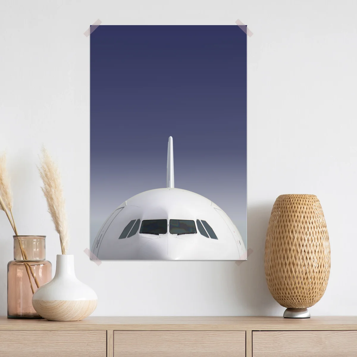 Poster frontansicht eines flugzeugs vor blauem himmel Poster frontansicht eines flugzeugs vor blauem himmel