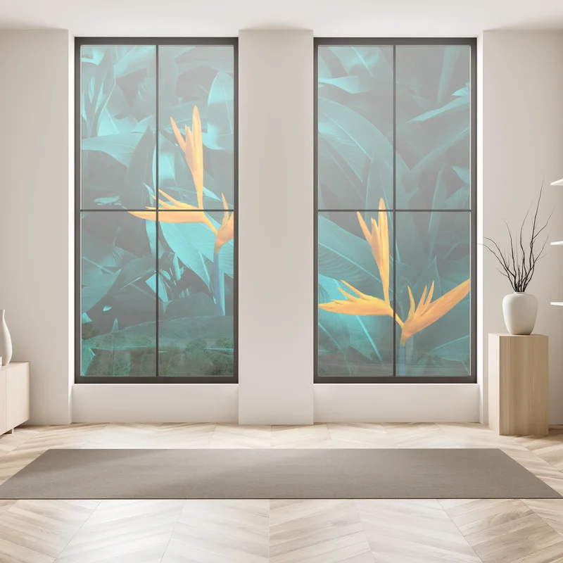 Naklejka na okno tropikalna strelicja na turkusowych liściach