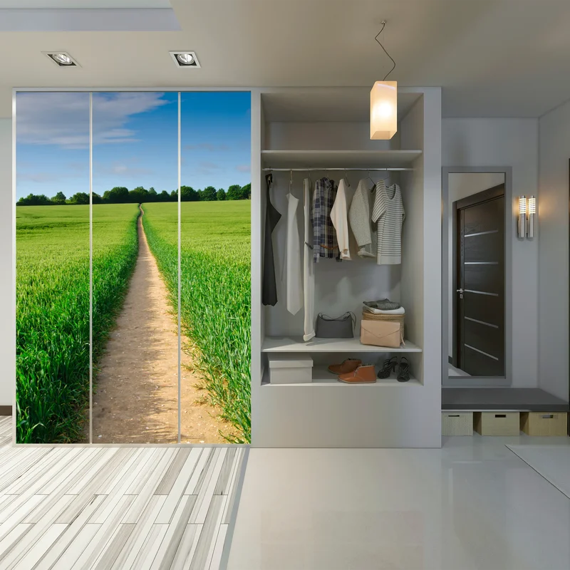 Schrankaufkleber sonnenbeschienener weg durch grüne wiese