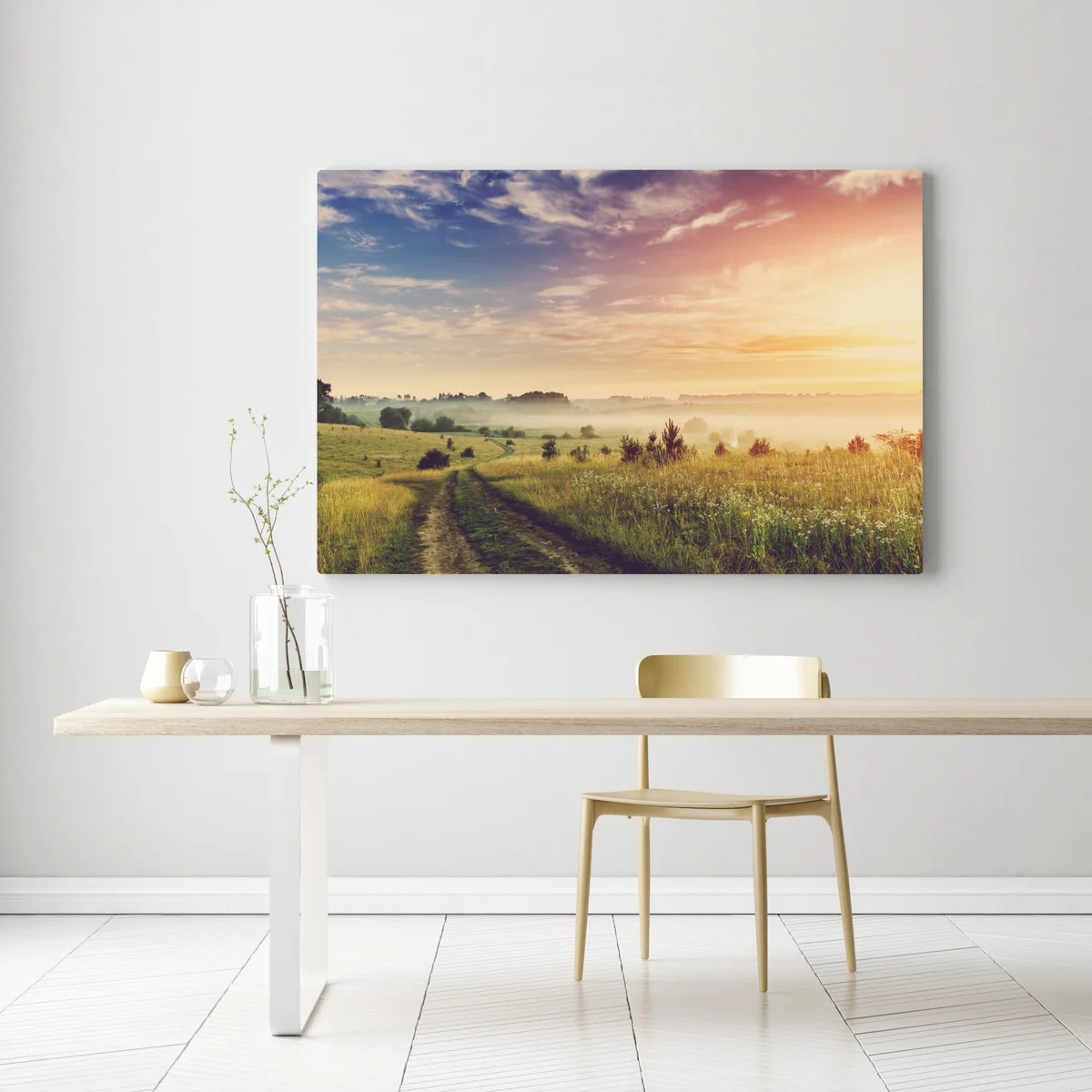 Leinwandbild nebeliger sonnenaufgang über einer ländlichen wiese Leinwandbild nebeliger sonnenaufgang über einer ländlichen wiese