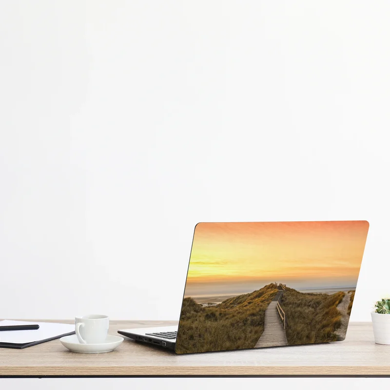 Naklejka na laptopa zachód słońca nad plażą Amrum Naklejka na laptopa zachód słońca nad plażą Amrum