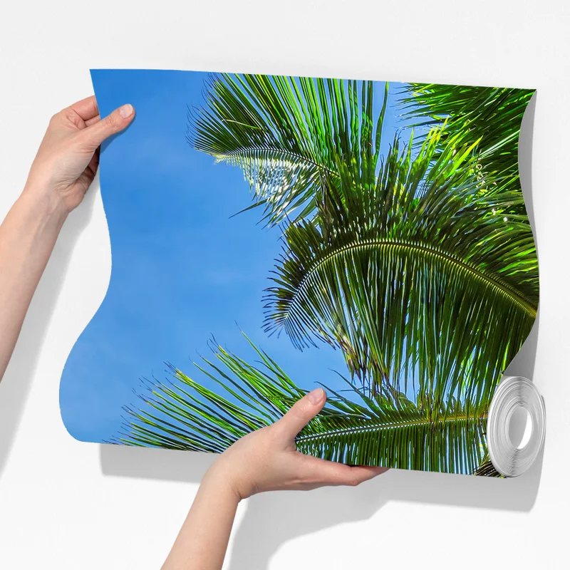 Fototapeta tropikalna plaża z palmami i żaglówką Fototapeta tropikalna plaża z palmami i żaglówką