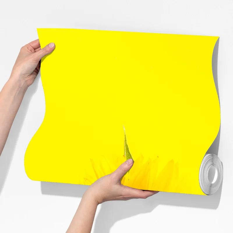 Fototapeta jasny bukiet słoneczników na żółtym tle Fototapeta jasny bukiet słoneczników na żółtym tle